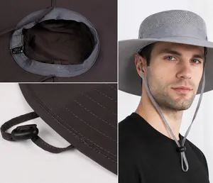 Detail of breathable mesh crown and adjustable windproof cord on quick-dry sun hat