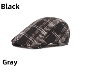 Detail of British plaid beret showing thick wool blend fabric in black and grey patterns
