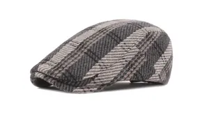 Detail shot of the textured grey plaid cashmere cotton newsboy cap for winter