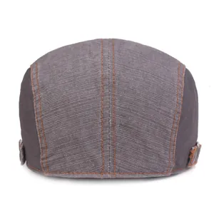 Coppola vintage da uomo in denim grigio con cuciture arancioni a contrasto e fibbia in metallo