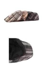 Detail of vintage plaid newsboy caps showing soft wool fabric and premium inner lining