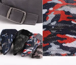 Detailansicht der Metallschnalle und des atmungsaktiven Mesh-Gewebes der Camouflage-Kappe