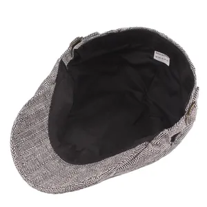 Classic grey herringbone newsboy flat cap with metal buckle and soft inner lining