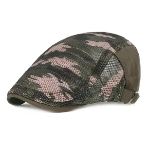 Detail of camouflage mesh cap featuring breathable fabric and silver metal buckle