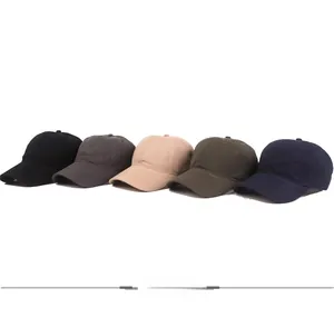 Detailed view of five cotton baseball caps in black, grey, khaki, green, and navy blue