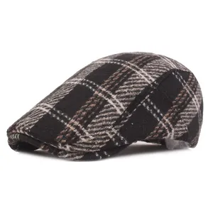 British style checkered newsboy cap for women in black and brown plaid pattern