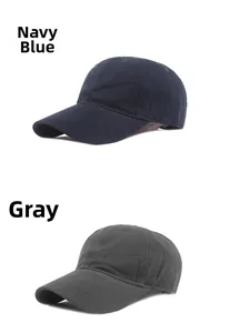Detail view of cotton baseball caps in navy blue and grey colors with twill texture