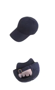Detail of navy blue cotton baseball cap showing 6-panel structure and metal buckle