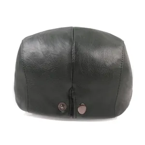 Béret en similicuir vert foncé pour hommes et femmes avec texture grainée et boutons en métal