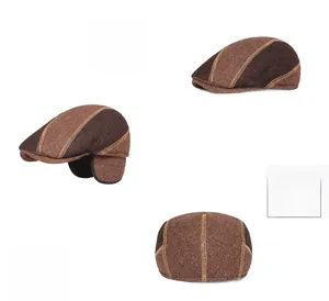 Detail of wool blend flat cap with brown herringbone pattern and foldable ear flaps