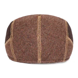 Mens winter herringbone wool flat cap with warm ear protection and vintage stitch detail