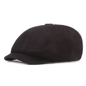 Classic black newsboy cap for men and women made of durable cotton twill fabric