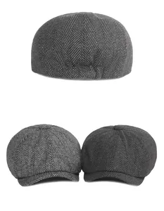 Detailed macro view of herringbone texture on vintage newsboy flat cap for men