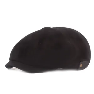 Classic black cotton newsboy cap featuring vintage side metal rivet in a side view profile