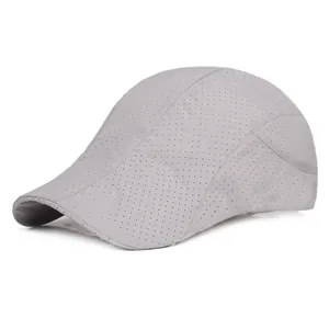 Detail of light grey baseball cap featuring laser-cut breathable mesh ventilation holes