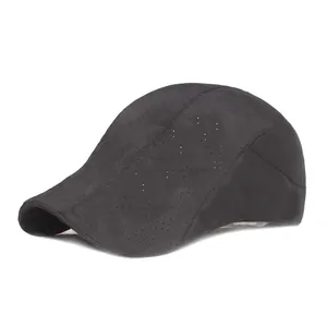 Detailed view of dark grey baseball cap featuring laser-cut ventilation holes and stitching