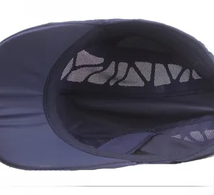 Detailed close-up showing breathable mesh interior of a navy blue quick-dry sports cap