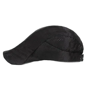 Detail of laser-perforated mesh and adjustable buckle on black flat top breathable cap