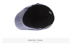 Internal view of blue plaid ivy cap showing black lining and adjustable metal buckle