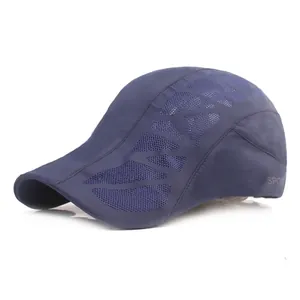 Detail of dark blue mesh baseball cap with SPORT lettering and breathable mesh fabric
