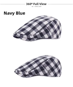 Detail view of navy blue plaid pattern on classic fabric flat cap with texture