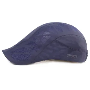 Detailed side view of navy blue mesh baseball cap with gray sports printing text