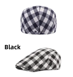 Detail of black and white checkered flat cap with vintage metal buckle fasteners