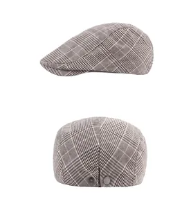 Detail view of the vintage gray plaid flat cap with adjustable metal back buckle buckle