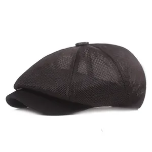 Breathable black mesh newsboy cap with classic peak for summer sun protection