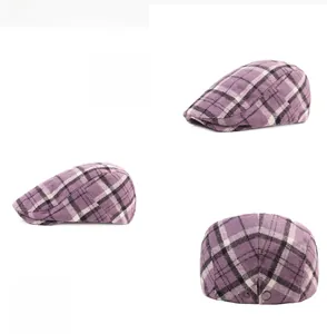 Detail view of purple plaid cotton flat cap showing check pattern and 3D tailored stitching
