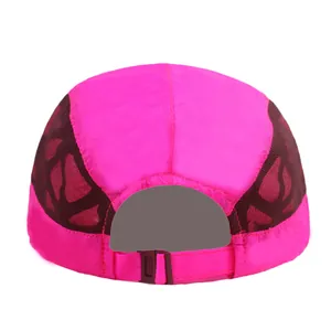 Detail view of the breathable mesh panels and adjustable buckle strap on a pink sports cap