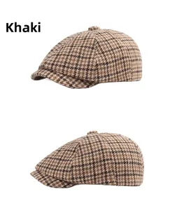 Detail view of khaki plaid ivy cap with classic vintage pattern for autumn and winter