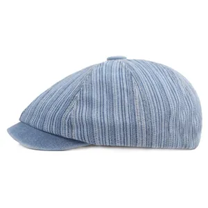 Light blue striped corduroy newsboy cap with a vintage silhouette shown from side profile