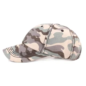 Detail of woodland camouflage baseball cap featuring reinforced stitching on curved brim