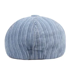 Back view of light blue striped denim flat cap with premium textured twill fabric