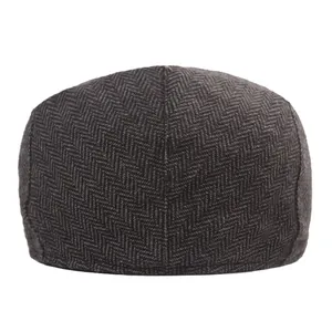 Classic herringbone tweed newsboy cap in brown grey for autumn and winter warmth