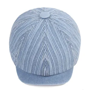Classic light blue denim newsboy cap with vintage striped texture and top button detail