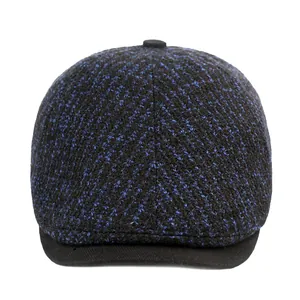 Béret en tricot bleu et noir pour hommes et femmes avec texture de laine chaude
