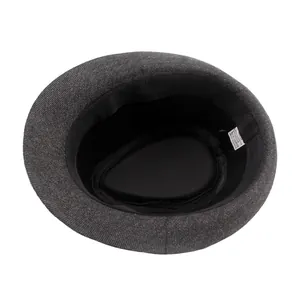 Interior view of vintage grey fedora hat for men featuring soft wool-like fabric texture