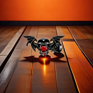 Détail d'un piercing gothique avec crâne, ailes de chauve-souris et gemme rouge