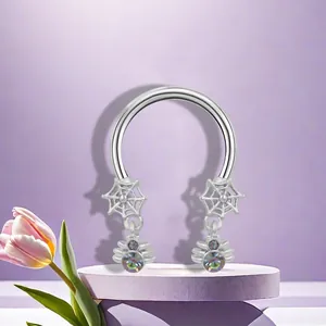 Gothic horseshoe nose ring with silver spider web design and iridescent gemstone pendants