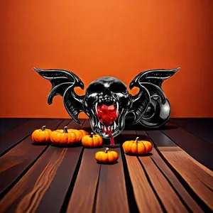 Vue détaillée du plug gothique crâne et chauve-souris avec bijou coeur rouge