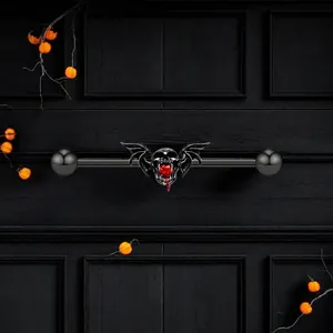 Barbell industriel gothique noir avec crâne à ailes de chauve-souris et cœur rouge
