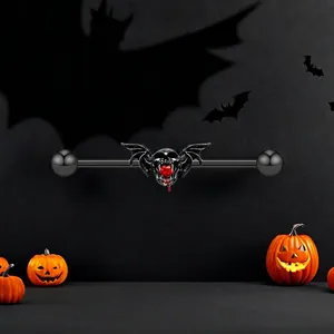 Piercing industriel gothique avec crâne ailé et gemme cœur rouge Halloween