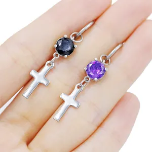 Pair of stainless steel cross dangle earrings with black and purple round faceted gems