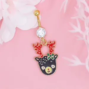 Macro de piercing de ombligo dorado con colgante de reno navideño y circón brillante