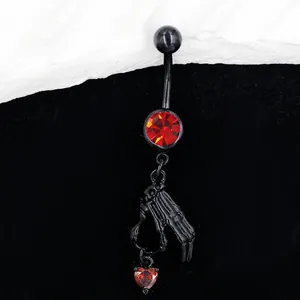 Piercing de nombril gothique avec main de squelette noire et pendentif en zircon rouge