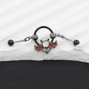 Gothic bat piercing ring in black metal with red enamel wings and opal stone