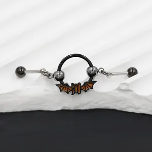 Industrial barbell earring with a black bat charm and Boo text on a sleek display