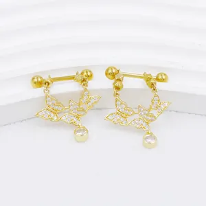 Detailed view of butterfly breast ring with gold plating and cubic zirconia butterfly pendant